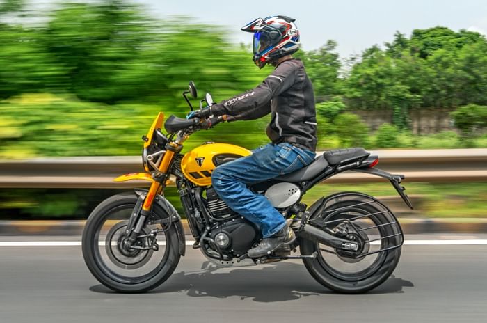 Triumph Scrambler 400 XC left side profile riding shot